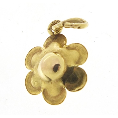 725 - 9ct gold pearl flower head charm, 1.2cm high, 0.6g