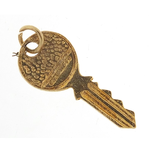 316 - 9ct gold key charm, 2.3cm high, 1.2g