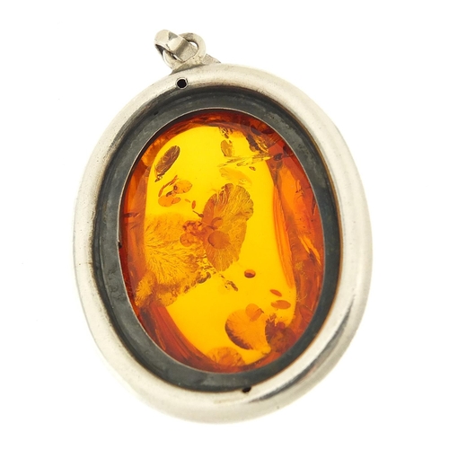 216 - Large silver and natural amber pendant, 7.5cm high, 46.8g