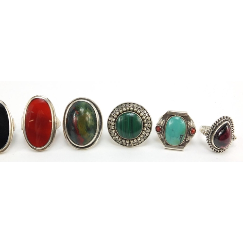 873 - Twelve silver semi precious stone rings including lapis lazuli, malachite, turquoise and moss agate,... 