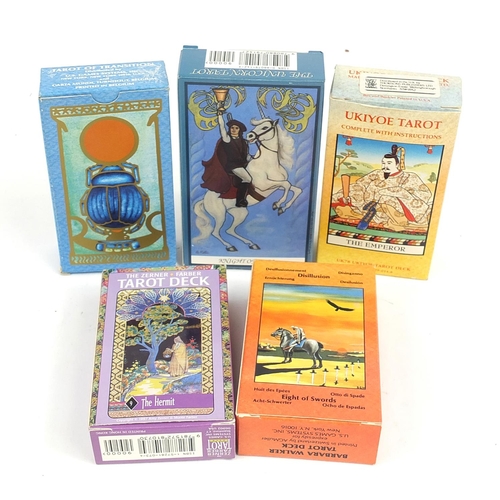 1062 - Five fortune telling tarot card decks comprising Barbara Walker Tarot, Tarot of Transition, The Zern... 