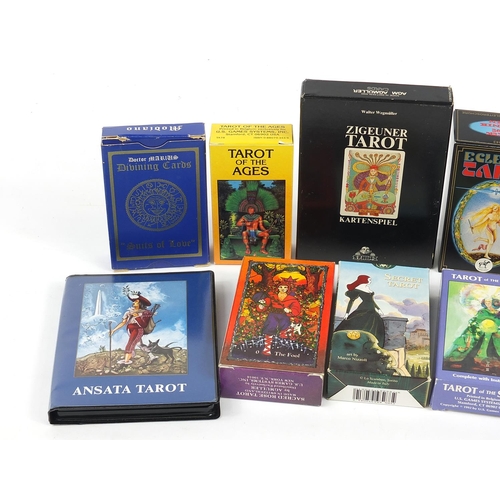 1018 - Eleven fortune telling tarot card decks including Ansata Tarot, Tarot of the Ages and Deva Tarot