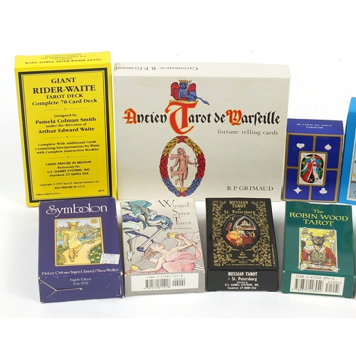 1065 - Twelve fortune telling tarot card decks including Robin Hood Tarot and Winged Spirit Tarot