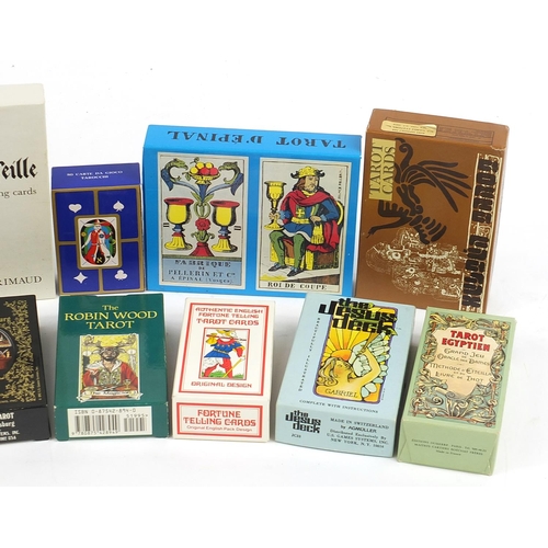 1065 - Twelve fortune telling tarot card decks including Robin Hood Tarot and Winged Spirit Tarot