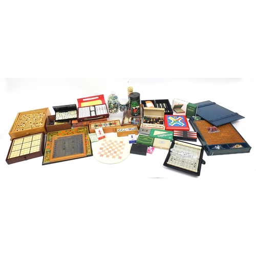 1251 - Vintage and later board games, cards, compendiums and marbles including chess and dominoes