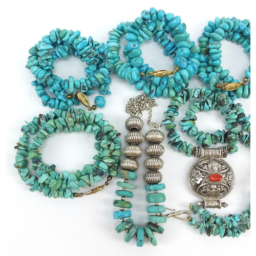 741 - Seven turquoise matrix necklaces and a bracelet, some with silver mounts, 350.0g