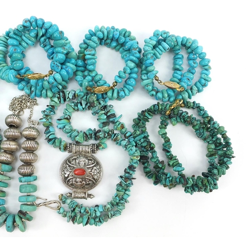 741 - Seven turquoise matrix necklaces and a bracelet, some with silver mounts, 350.0g