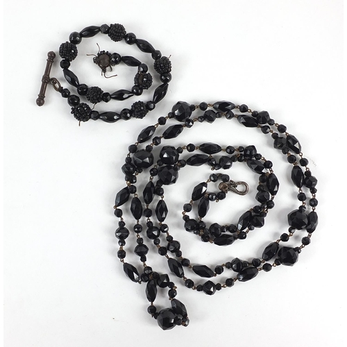 1041 - Victorian Whitby jet necklace and bracelet, the necklace 130cm in length, total 84.0g