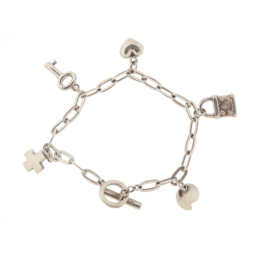 982 - Silver charm bracelet with charms including a love heart, lock and key, 16cm in length, 15.2g