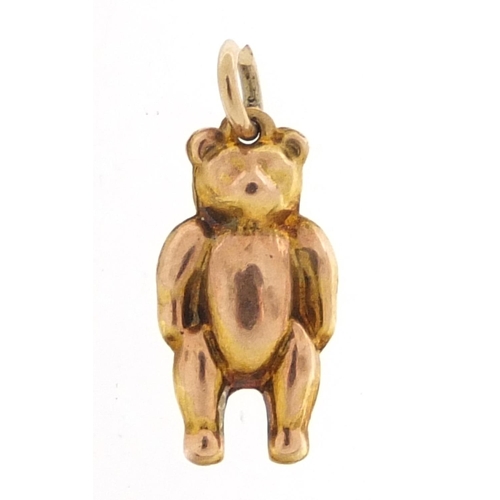 541 - 9ct gold teddy bear charm, 1.5cm high, 0.5g