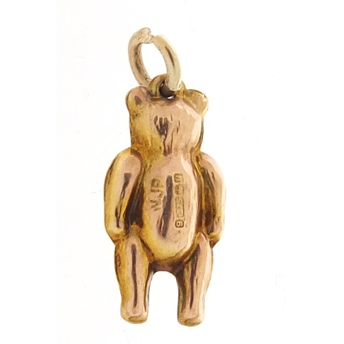 541 - 9ct gold teddy bear charm, 1.5cm high, 0.5g