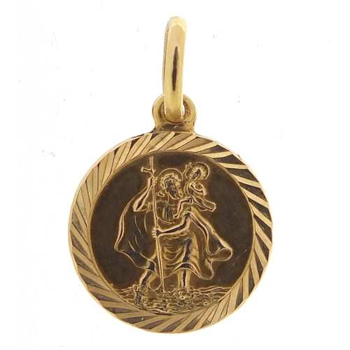 549 - 9ct gold St Christopher charm, 1.6cm high, 0.9g