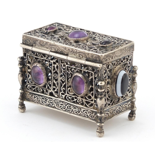 284 - Antique 800 German silver pierced casket set with agate and amethyst cabochons, the hinged lid embos... 