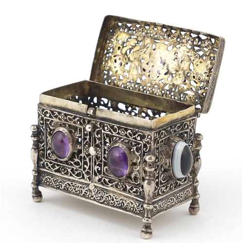 284 - Antique 800 German silver pierced casket set with agate and amethyst cabochons, the hinged lid embos... 