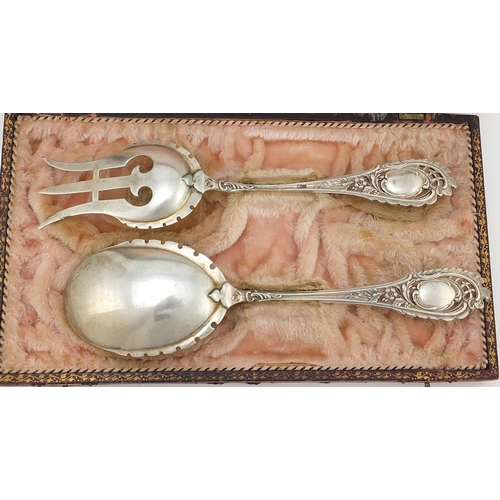 620A - Swiss silver coloured salad servers, the fork stamped 800, housed in an E Richard Basbezat? tooled l... 