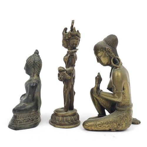 196A - Three Middle Eastern bronze figures including an Indian Goddess and figure of Buddha, from Nepal or ... 