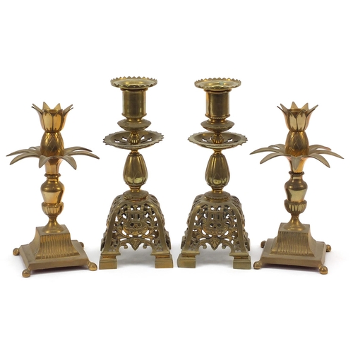 20 - Two pairs of brass classical candlesticks including a pair of pineapple design, the largest each 23c... 