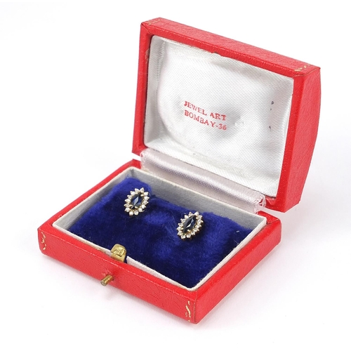 1200 - Pair of 14ct gold sapphire and cubic zirconia stud earrings, 11mm high, 2.2g