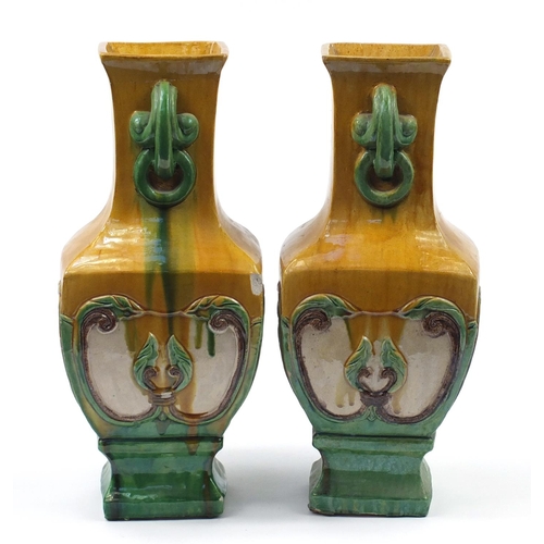 916 - Large pair of Chinese stoneware slab sided vases with ring turned twin handles having sancai type gl... 