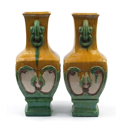 916 - Large pair of Chinese stoneware slab sided vases with ring turned twin handles having sancai type gl... 