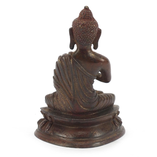 924 - Chino-Tibetan patinated bronze figure of Buddha, 16cm high