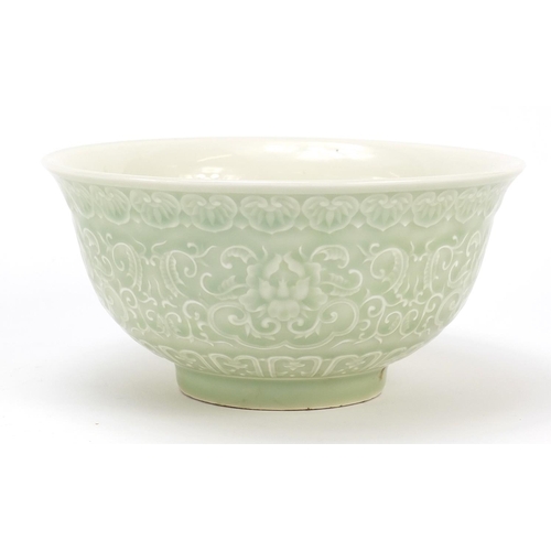 917 - Chinese porcelain celadon glazed bowl decorated with flowers amongst scrolling foliage, 16cm in diam... 