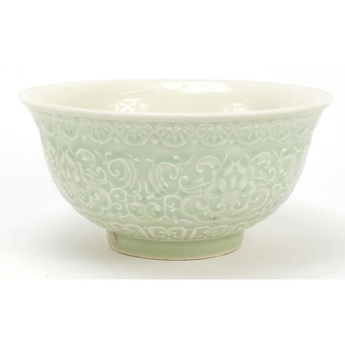 917 - Chinese porcelain celadon glazed bowl decorated with flowers amongst scrolling foliage, 16cm in diam... 