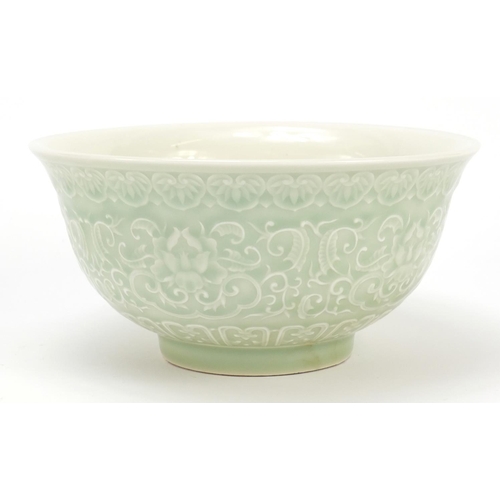 917 - Chinese porcelain celadon glazed bowl decorated with flowers amongst scrolling foliage, 16cm in diam... 