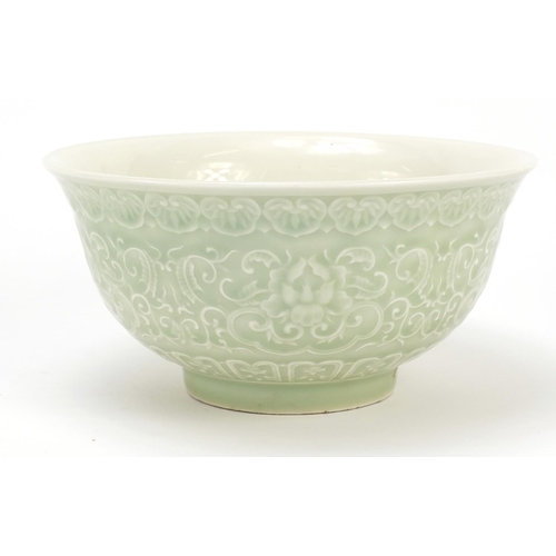 917 - Chinese porcelain celadon glazed bowl decorated with flowers amongst scrolling foliage, 16cm in diam... 