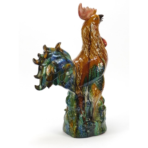 914 - Large Chinese porcelain cockerel having a sancai type glaze, 58.5cm high