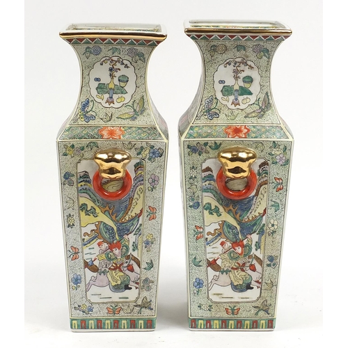912 - Large pair of Chinese porcelain vases with animalia ring turned handles, each hand painted with figu... 