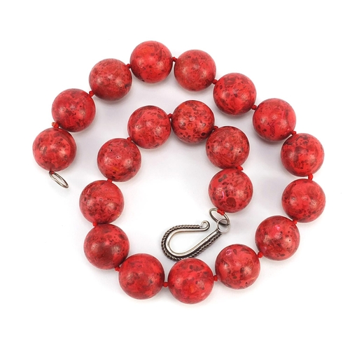 1127 - Red hardstone bead necklace, possibly coral, 48cm in length