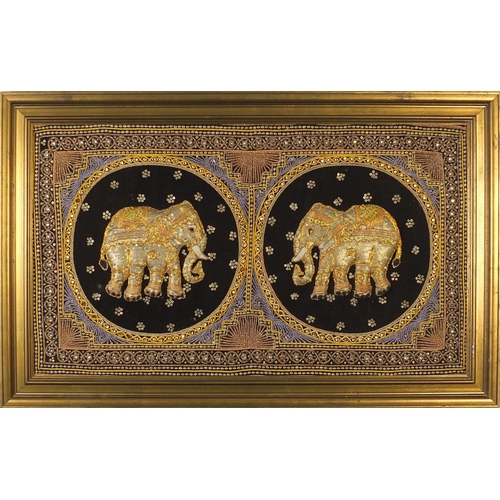 451 - Indian embroidered panel with two elephants, mounted and framed, 87cm x 50cm excluding the frame