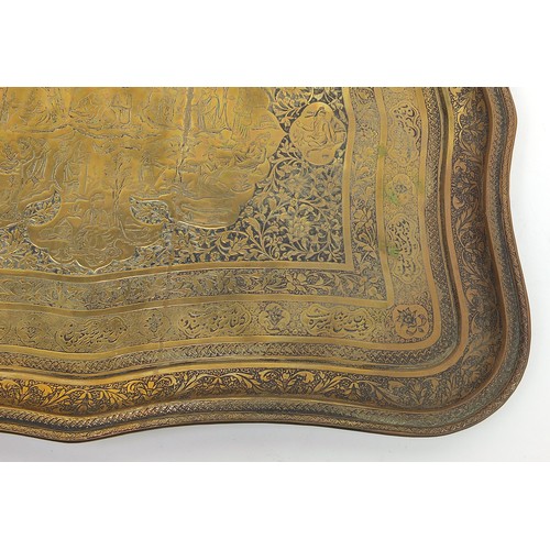 62 - Good Islamic brass tray finely engraved with figures amongst flowers and calligraphy, 47cm x 34cm