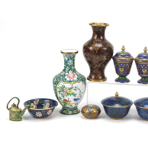 670 - Chinese cloisonné and Canton enamel including two pairs of vases and a pair of tea bowls with saucer... 