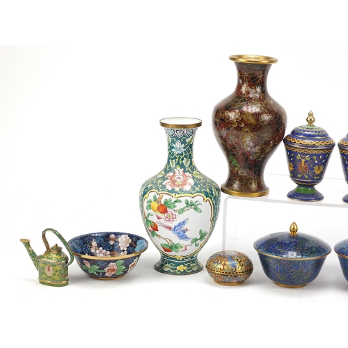 670 - Chinese cloisonné and Canton enamel including two pairs of vases and a pair of tea bowls with saucer... 