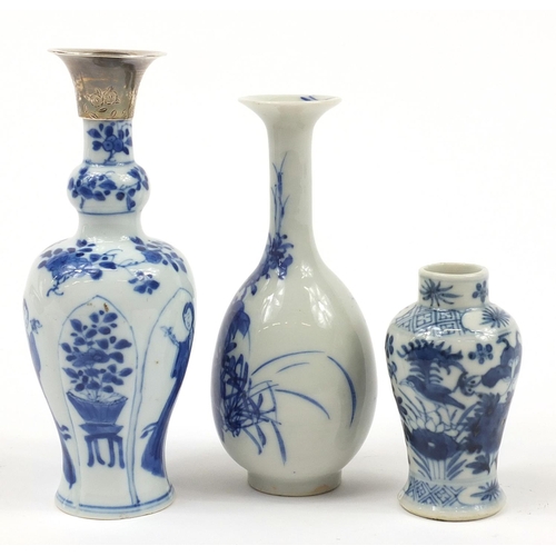 224 - Three Chinese blue and white porcelain vases including a silver topped example hand painted with fig... 