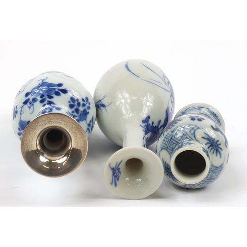 224 - Three Chinese blue and white porcelain vases including a silver topped example hand painted with fig... 