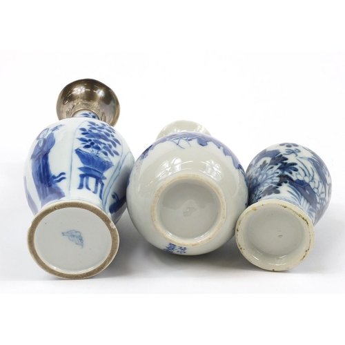 224 - Three Chinese blue and white porcelain vases including a silver topped example hand painted with fig... 