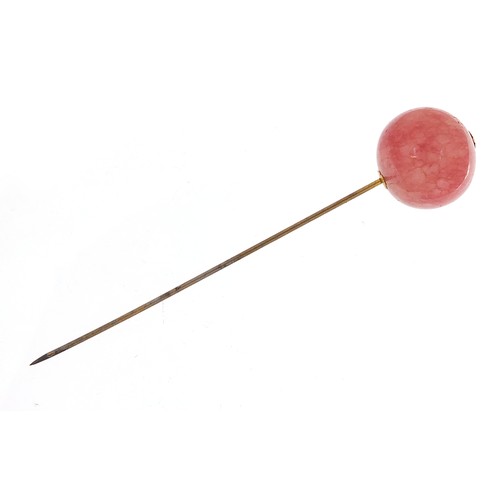 756 - Polished rose quartz hat pin, 13cm in length, 31.5g