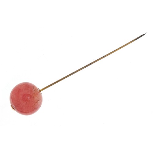 756 - Polished rose quartz hat pin, 13cm in length, 31.5g