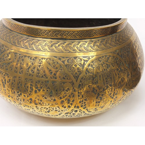 449 - Islamic Cairoware engraved with calligraphy and flowers including four bowls and a teapot, the large... 