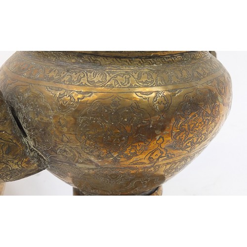 449 - Islamic Cairoware engraved with calligraphy and flowers including four bowls and a teapot, the large... 