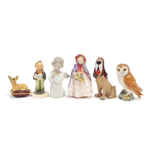 1331 - Collectable china comprising a Wade Blow Up trusty dog, Royal Doulton figurine Granny's shawl, Goebe... 
