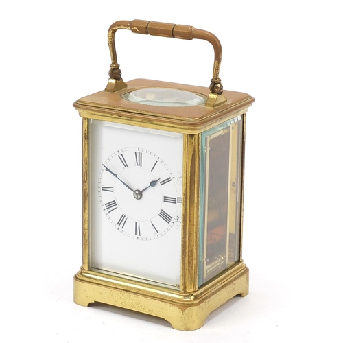 8 - Henri Jacot, large French brass cased carriage clock with enamelled dial having Roman numerals, numb... 