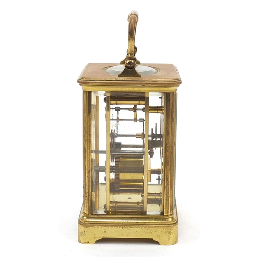 8 - Henri Jacot, large French brass cased carriage clock with enamelled dial having Roman numerals, numb... 