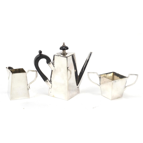273 - Silver plated three piece teaset in the manner of Christopher Dresser, the largest 12.5cm high