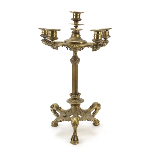 37 - 19th century gilt bronze six branch candelabra with grotesque mask heads and paw feet, 45cm high
