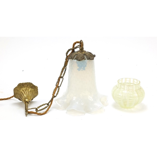 5 - Two Art Nouveau vaseline glass shades including one with gilt metal pendant fitting and frilled rim,... 