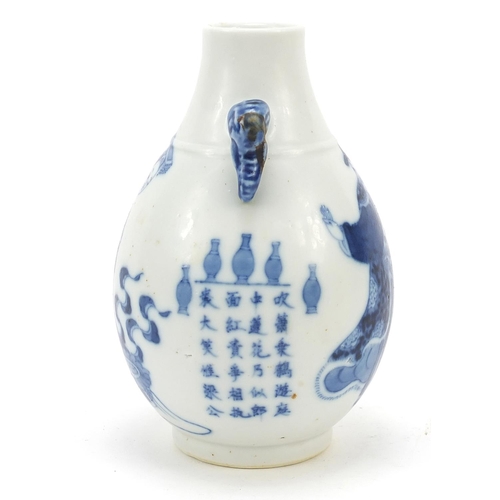 13 - Chinese blue and white porcelain vase with elephant head handles, finely hand painted with an Empero... 